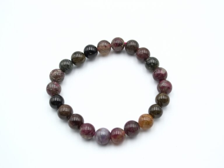 Bratara din Turmalina curcubeu (multicolora), forma bila slefuita de 9-10 mm, insirata pe elastic.